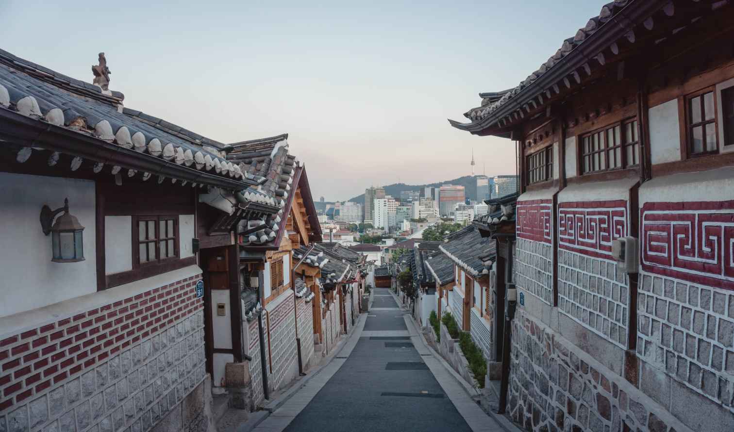 Traditional Korean houses along a road in Bukchon Hanok Village, Seoul.