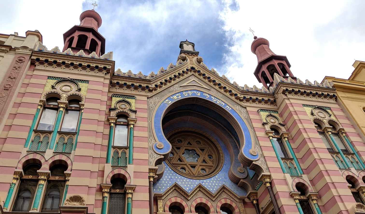 Jubilee Synagogue facade with colorful Moorish Revival architecture in Prague.