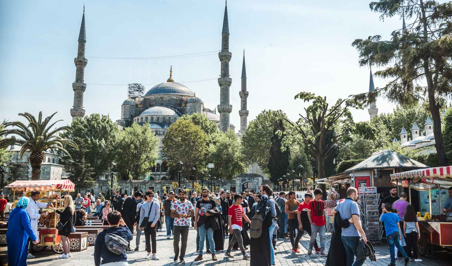 People walking near the Blue Mosque in Istanbul.