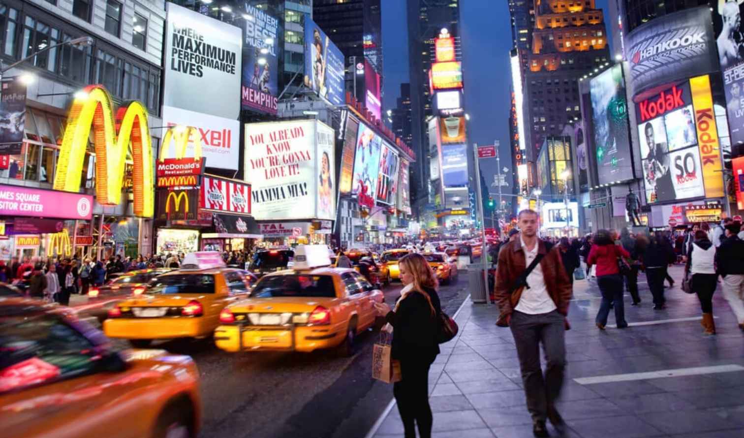 Billboards and people in Times Square, New York City.