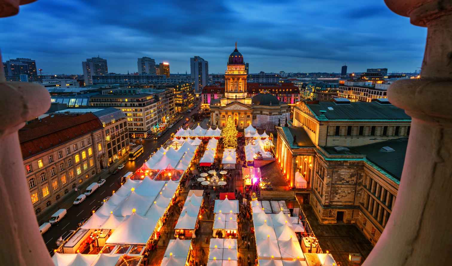 Aerial view of Gendarmenmarkt during an evening market in Berlin, Germany.