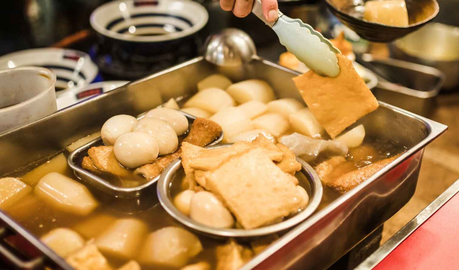Close-up of oden being prepared in a Japanese street food stall in Fukuoka
