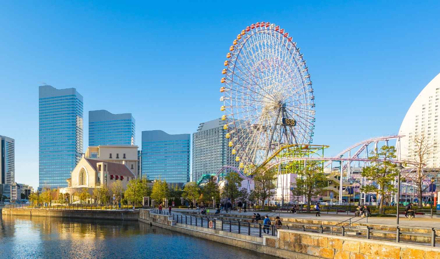 View of Yokohama Landmark Tower and Cosmo Clock 21 ferris wheel in Japan.