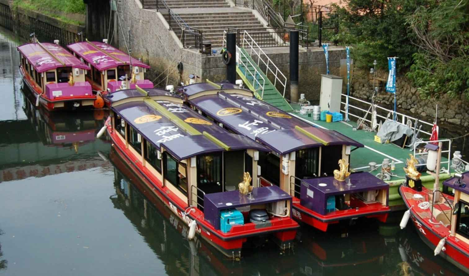 Colorful boats moored along the Yanagawa Canal in Nagoya.