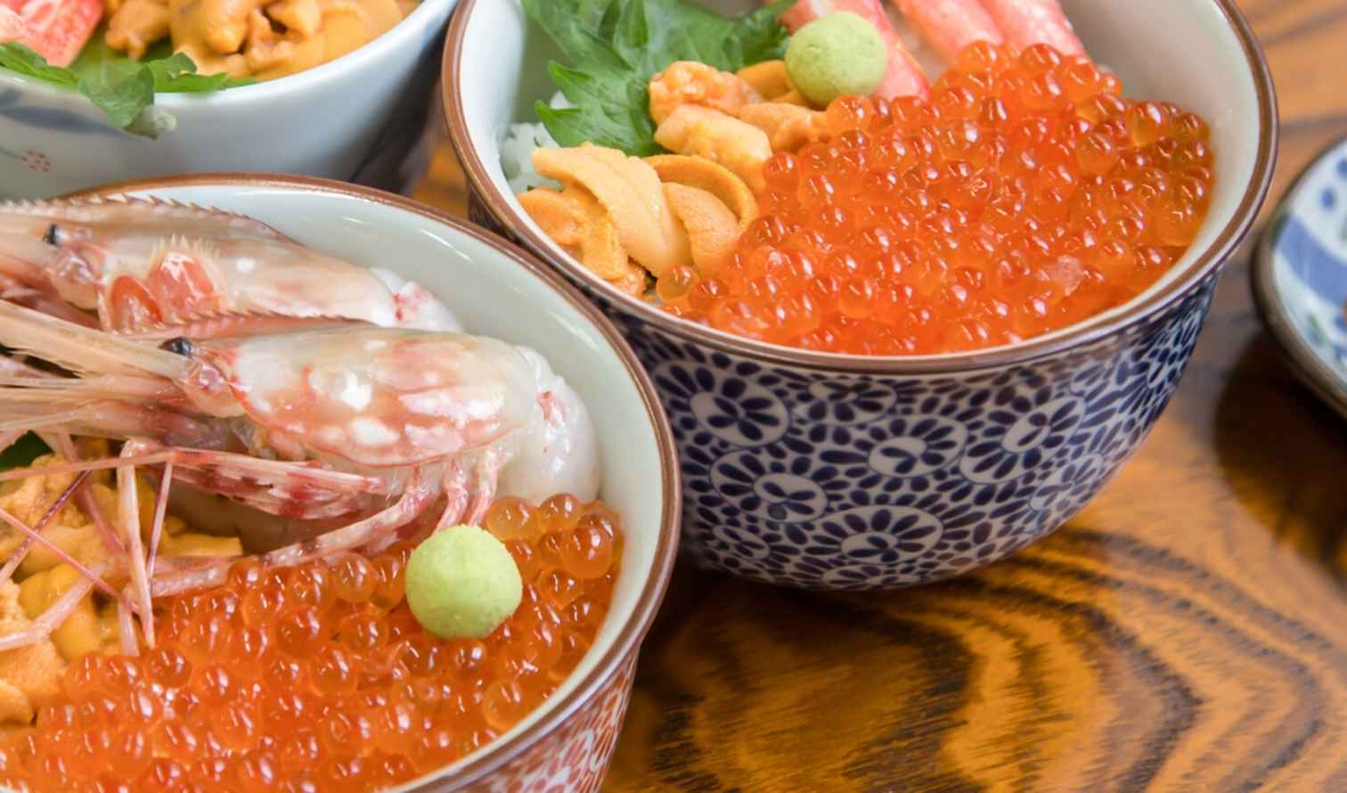 Traditional Japanese seafood rice bowls served with miso soup in Sapporo