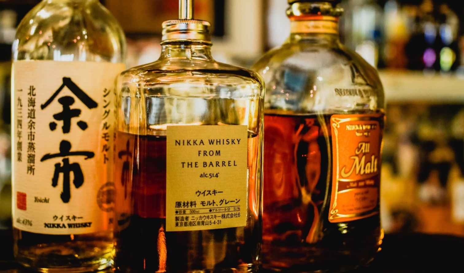 Left bottle labeled Yoichi, center labeled From the Barrel in Sapporo