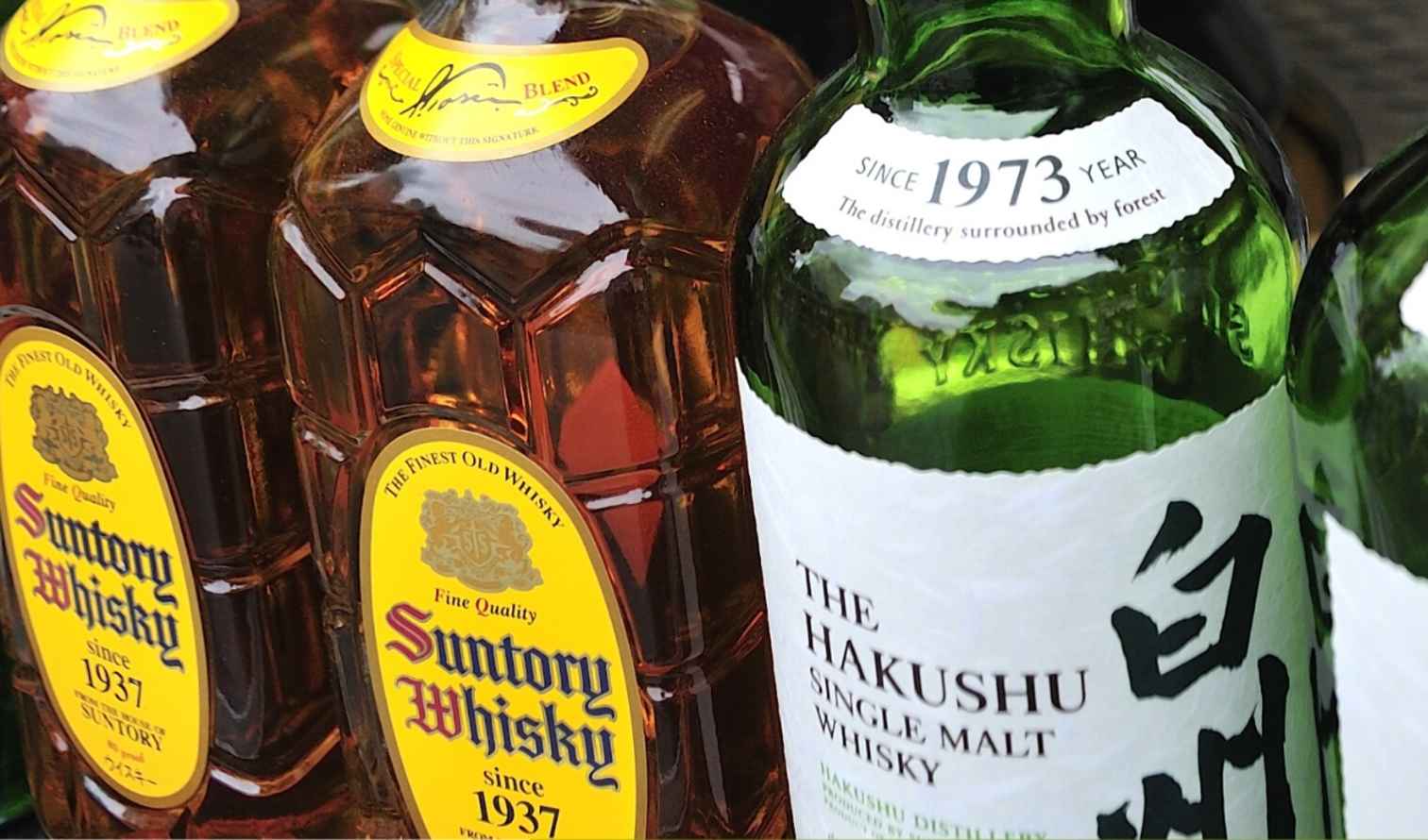 Assorted Suntory whisky bottles, highlighting labels from 1937  in Sapporo