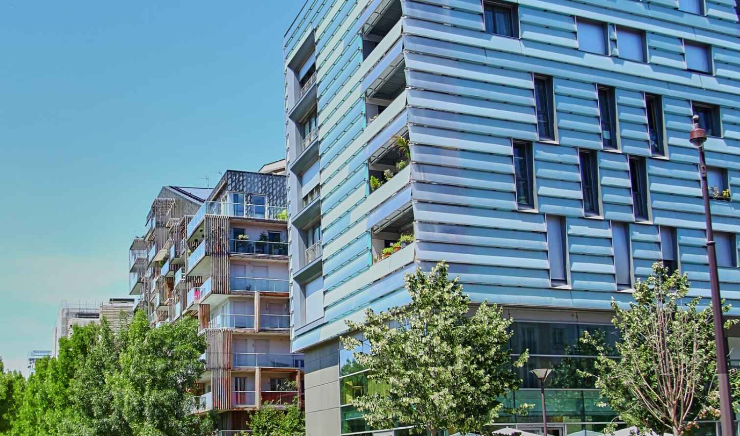 Modern building with a striped facade on Avenue de France, Paris.