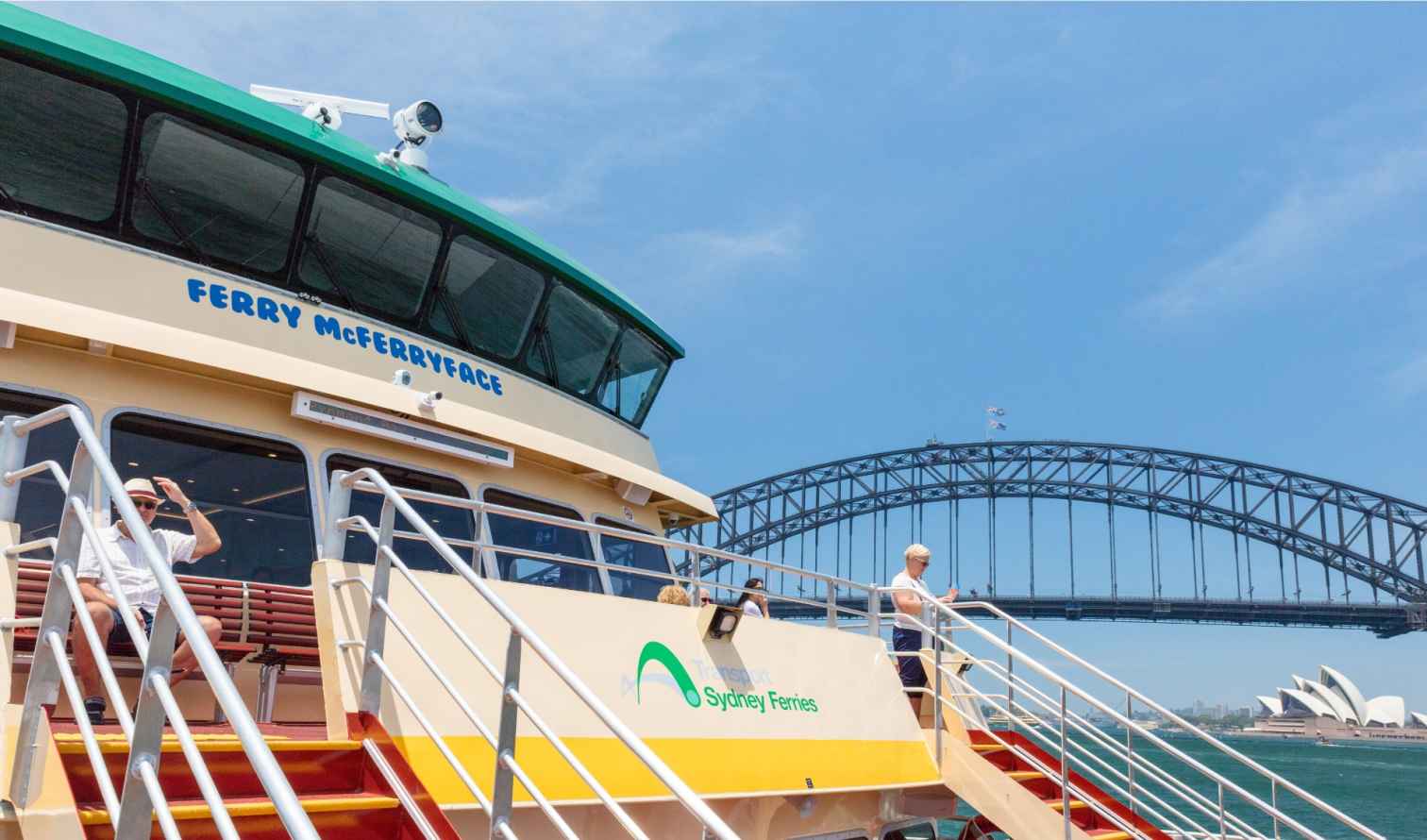 Sydney Ferry McFerryface near the Sydney Harbour Bridge and Opera House.