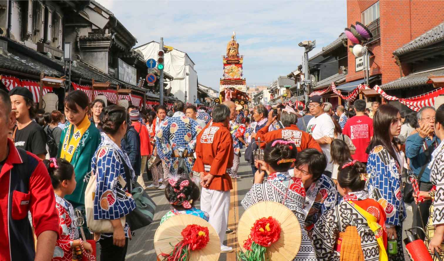 Crowd in traditional attire during festival on Kurazukuri Street, Kawagoe.