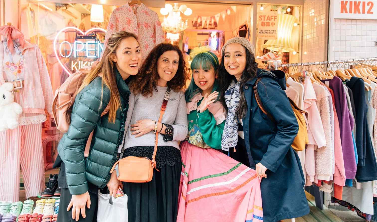 Four women stand outside KIKI2 clothing store in Harajuku, Tokyo.
