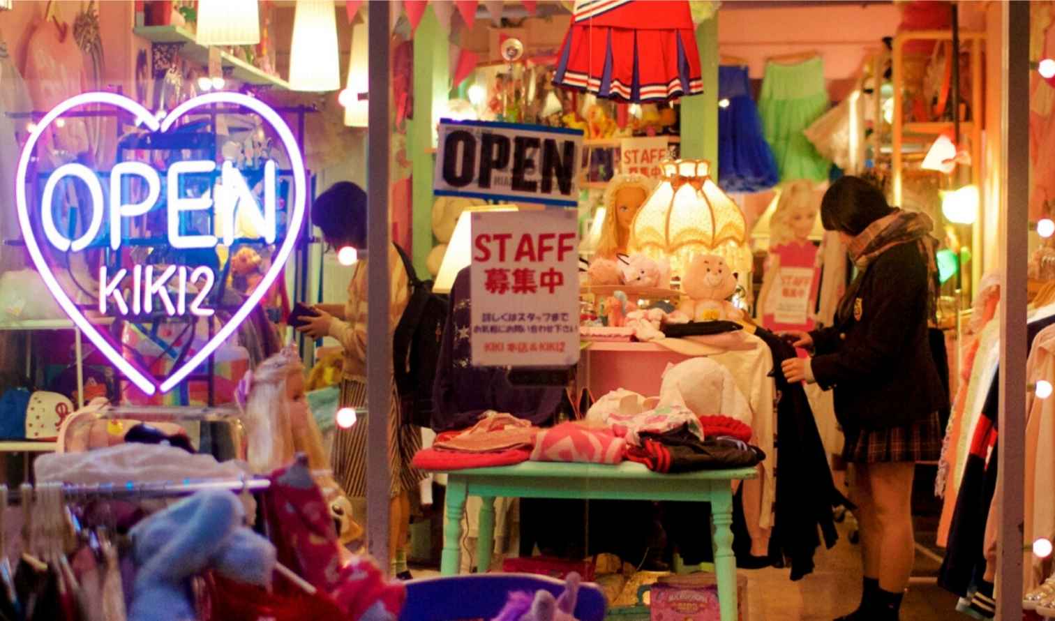 A shopper browses clothing at Kiki2 store in Harajuku, Tokyo.