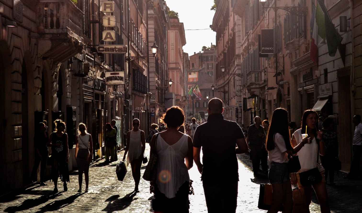 People walking on Via del Corso in Naples