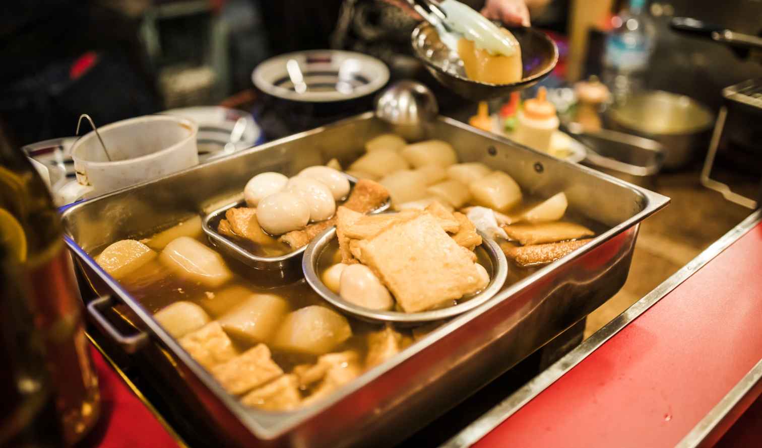 Close-up of oden being served at a food stall in Kanazawa