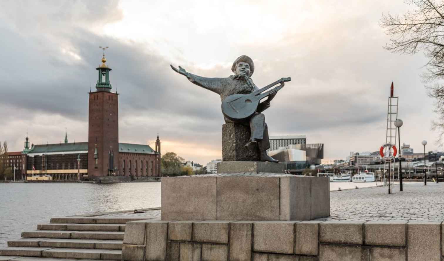 View of Evert Taube statue near the waterfront in Stockholm.