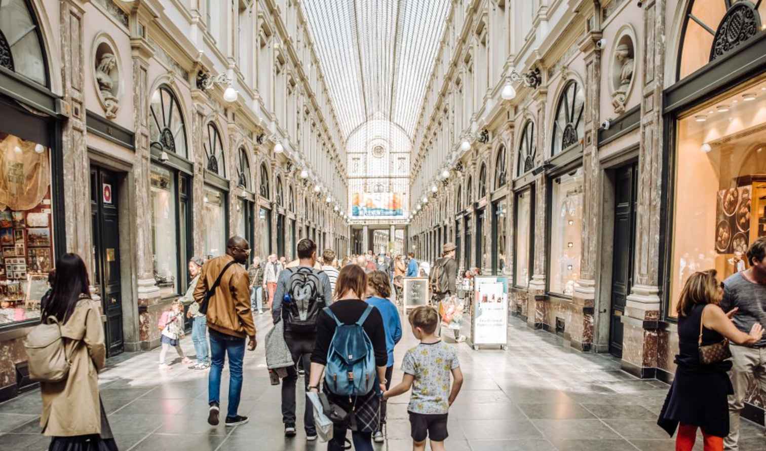 People walking through the Galeries Royales Saint-Hubert in Brussels.
