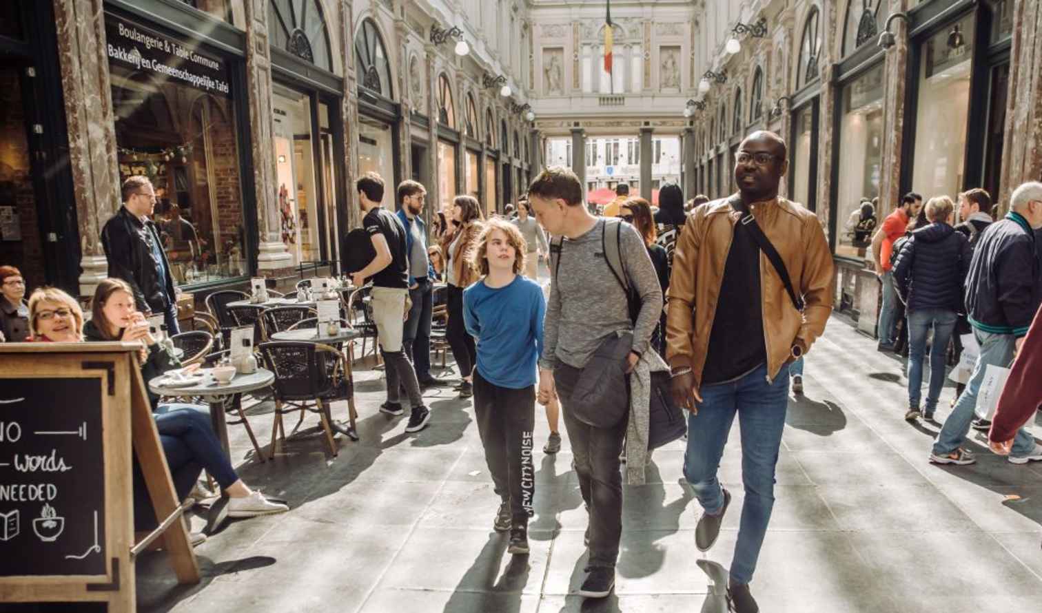 People walking in the Galerie du Roi, Brussels.