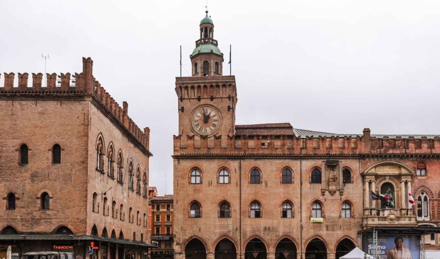 Palazzo Comunale with clock tower in Bologna, Italy.