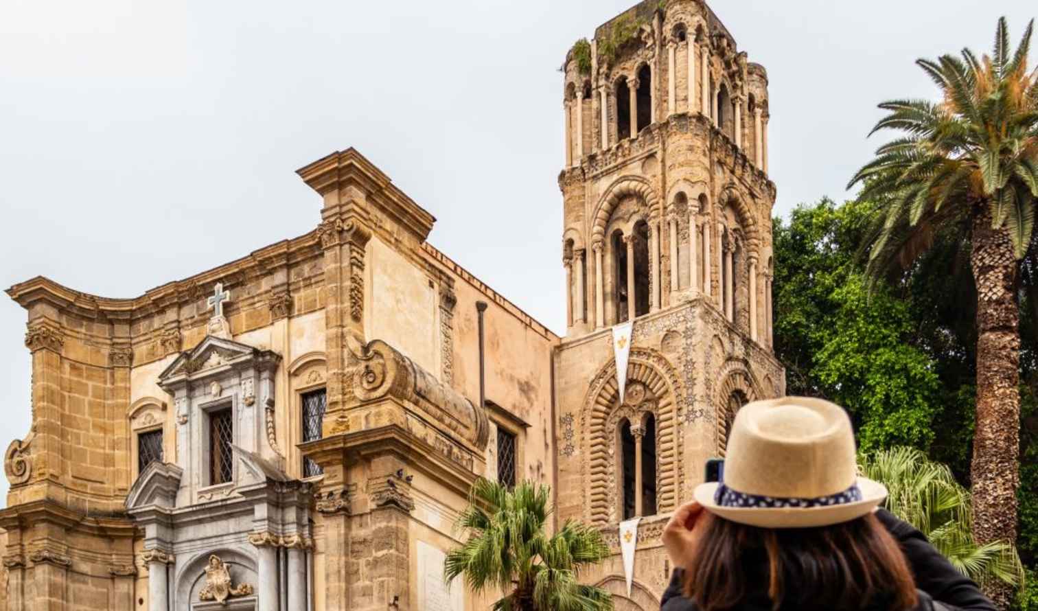 Person photographing San Cataldo Church in Palermo, Italy, with a smartphone.