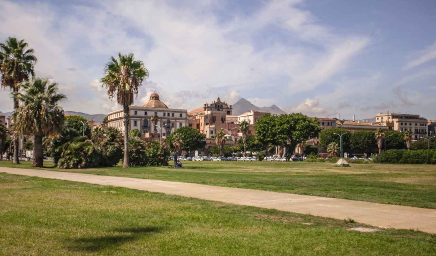 View of Foro Italico lawn with buildings in the background, Palermo, Italy.