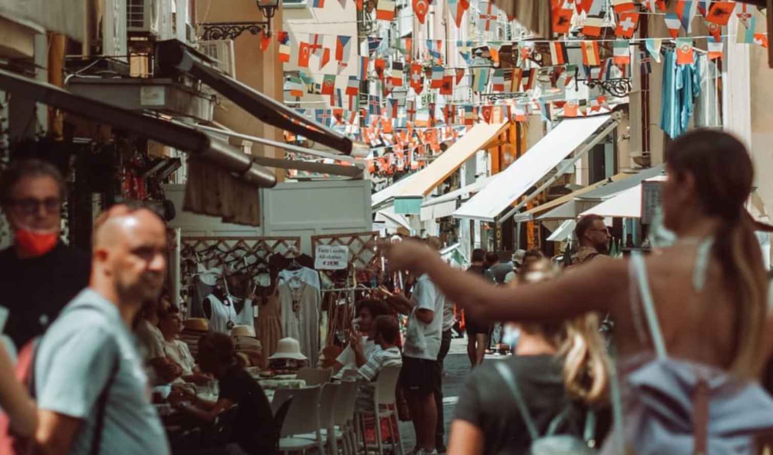View of a street scene with diners and shoppers in Sorrento