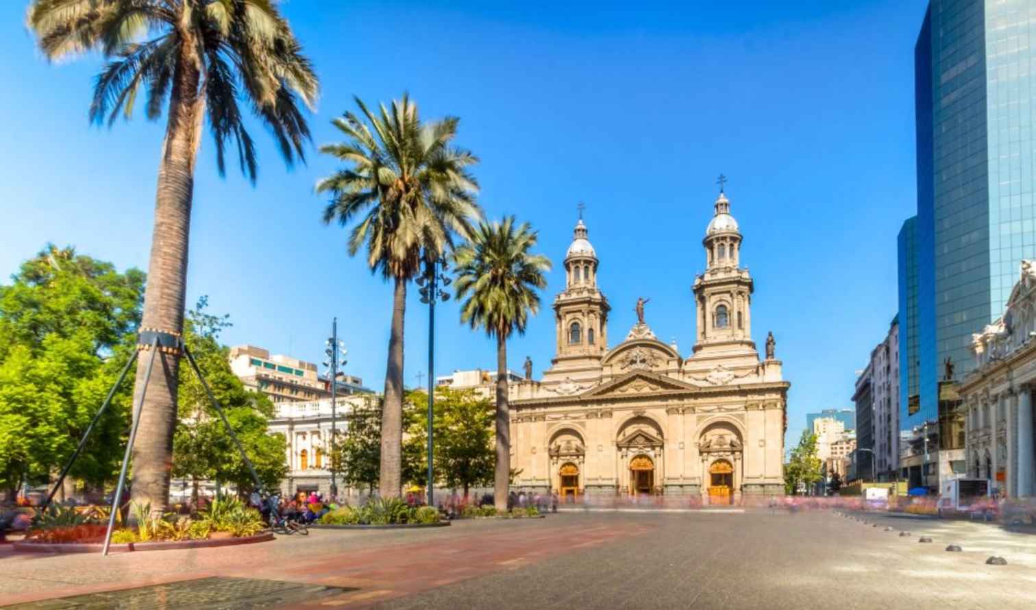 city,urban area,public space,landmark,town,street,pedestrian,church,tourist attraction,place of worship,metropolitan area,finial,travel,dome,town square,metropolis,plaza,palm trees,basilica,byzantine architecture,vacation,street light