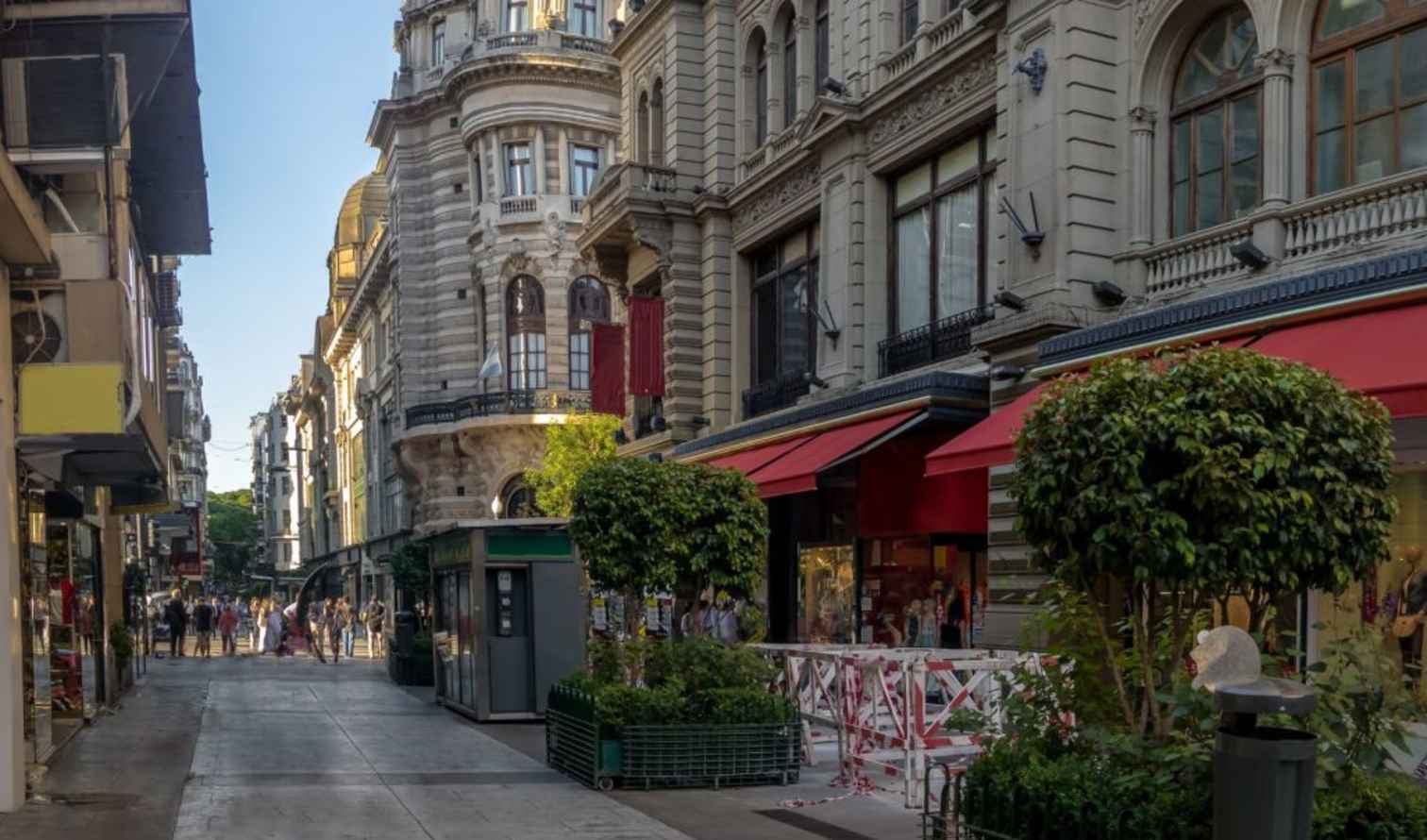 Pedestrians walking on Calle Florida, a famous shopping street in Buenos Aires.