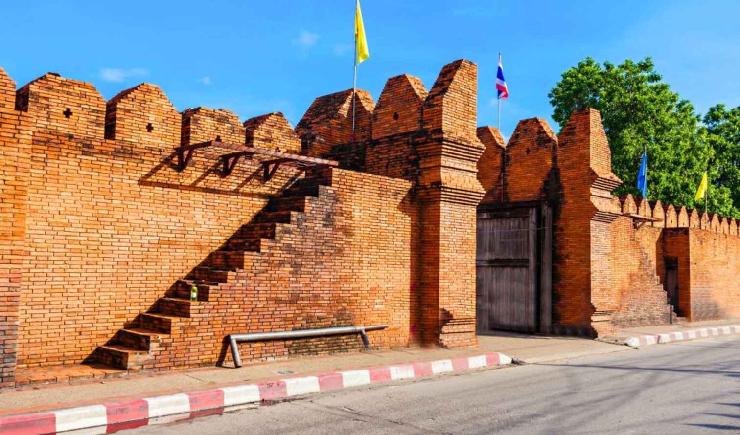 Close view of the outer wall and entrance of Tha Phae Gate in Chiang Mai.
