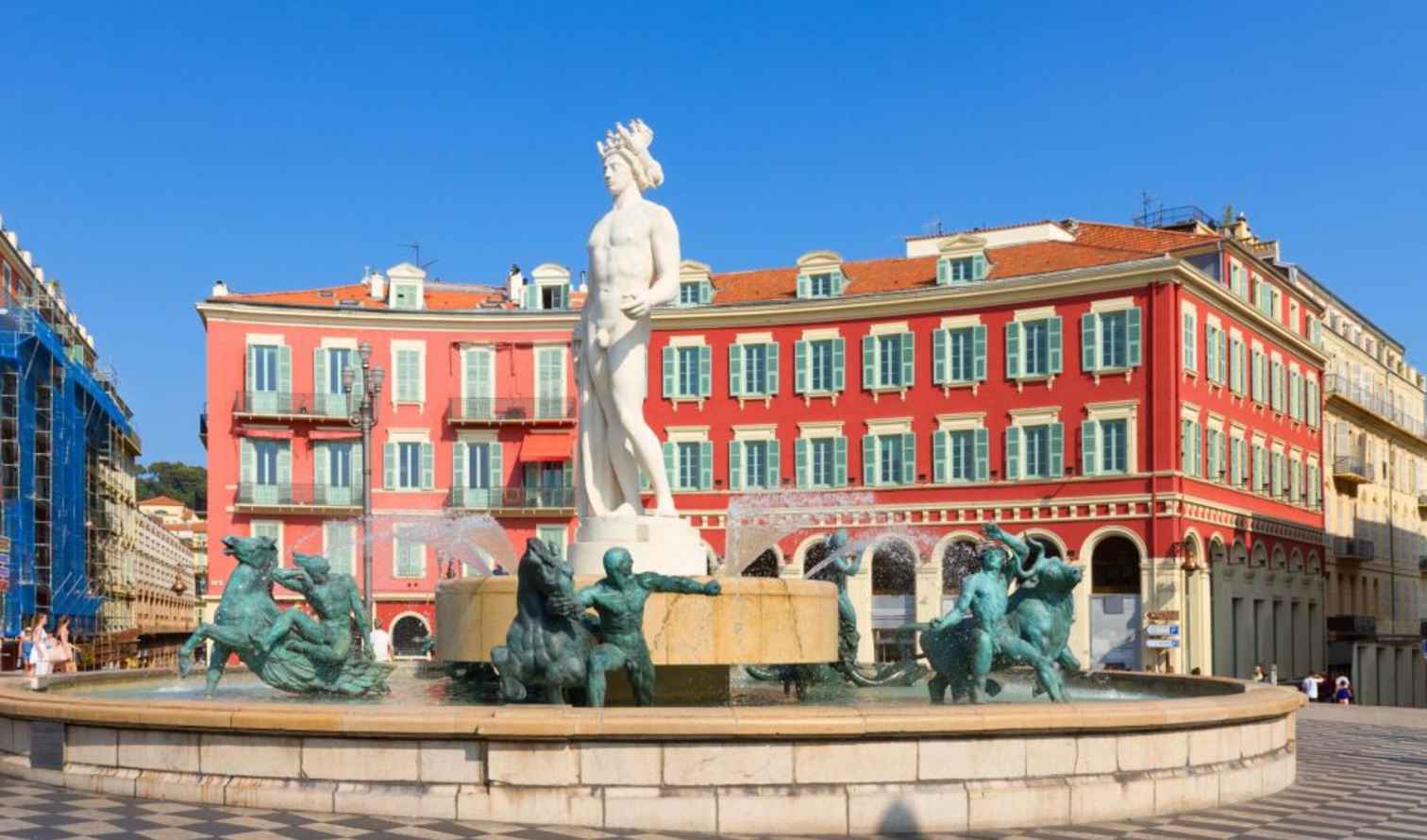 Neptune statue at Fontaine du Soleil, surrounded by classical architecture in Nice.
