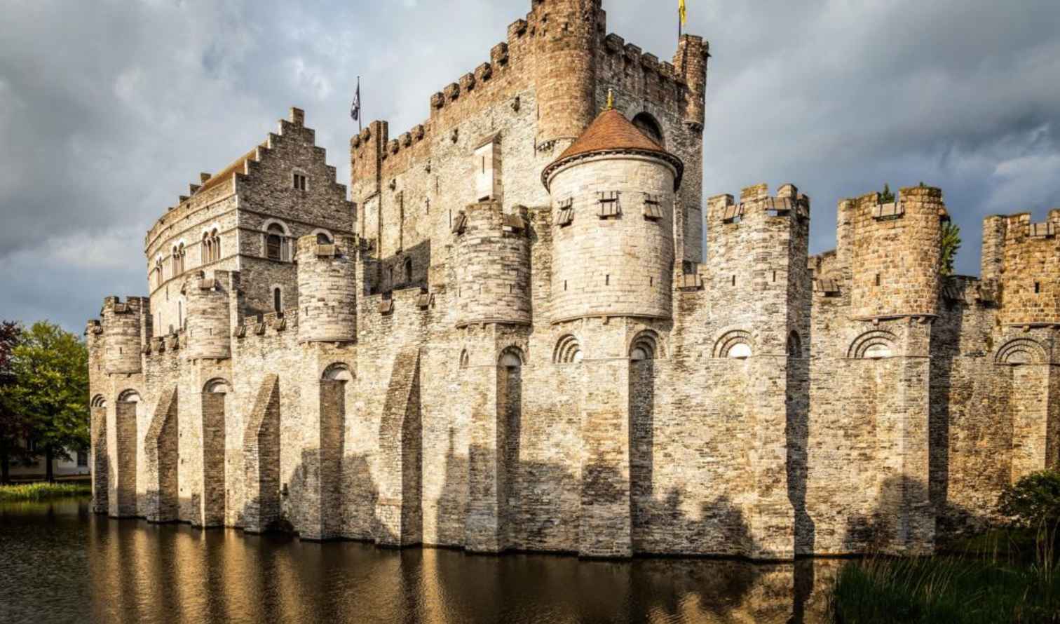 The battlements and towers of Gravensteen Castle in Belgium.