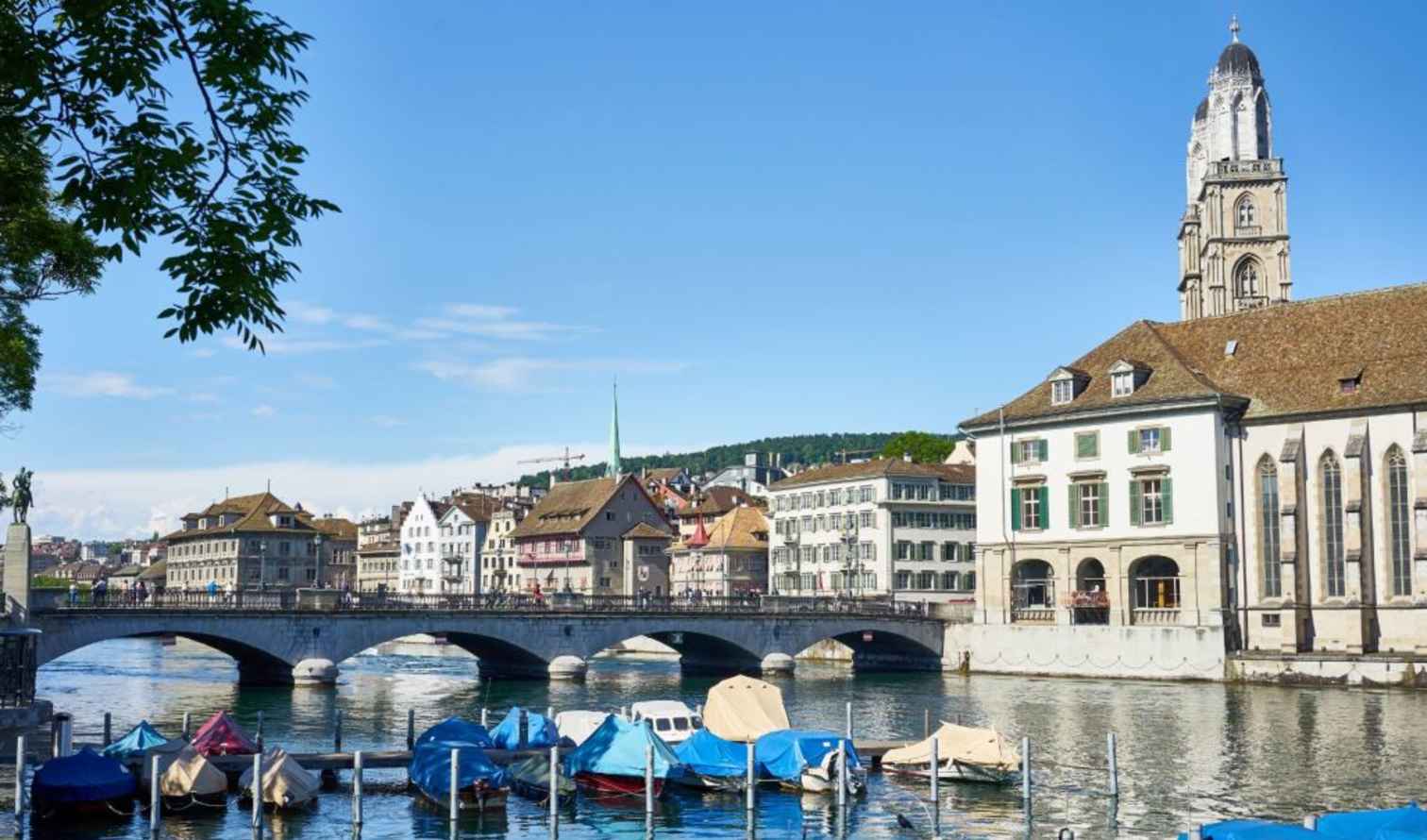 View of Grossmünster and the Limmat River in Zurich, Switzerland.