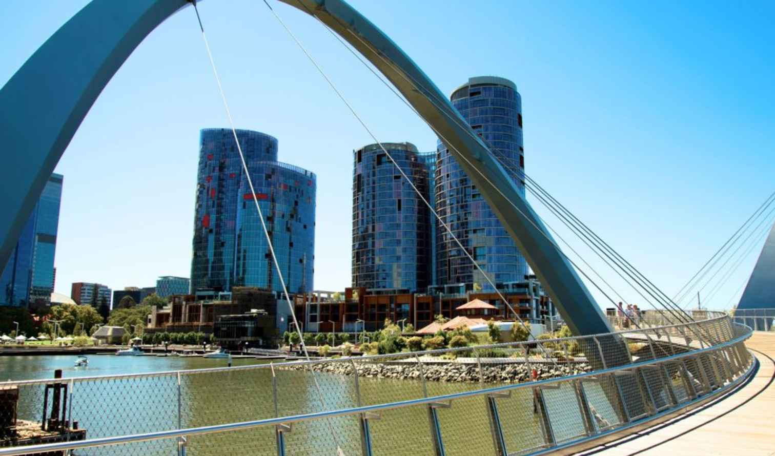 Elizabeth Quay Bridge overlooking riverfront buildings in Perth, Australia.