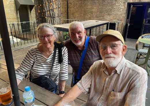 Cheers to Friendship in a Cozy Courtyard