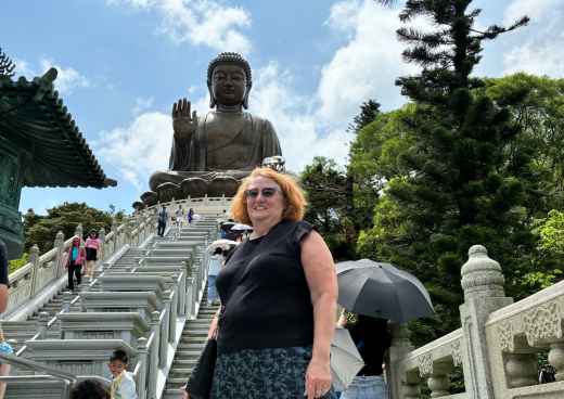 A Moment of Serenity: Standing with the Giant Buddha