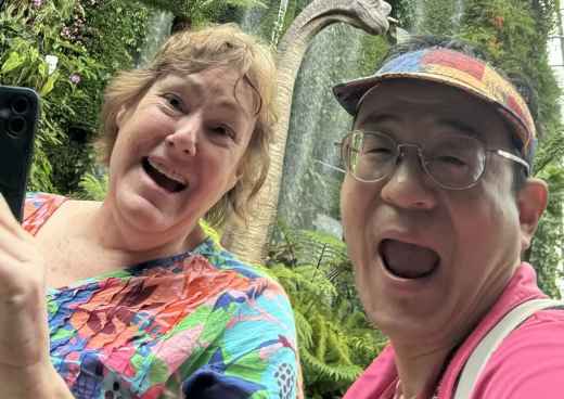 Delighted Wanderers Amidst Waterfalls