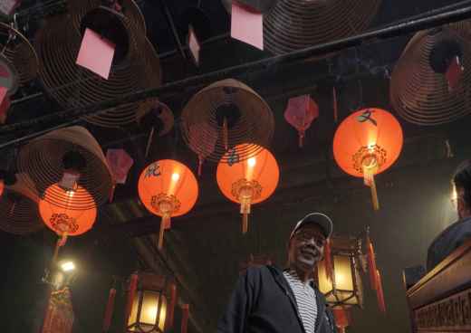 Embraced by Tradition: A Visitor's Awe in Red Lantern Light
