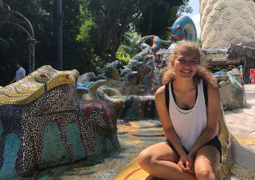 Sunlit Smiles Amid Mosaic Wonders