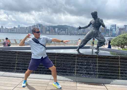 Showdown by the Harbor: A Playful Dance with a Legend