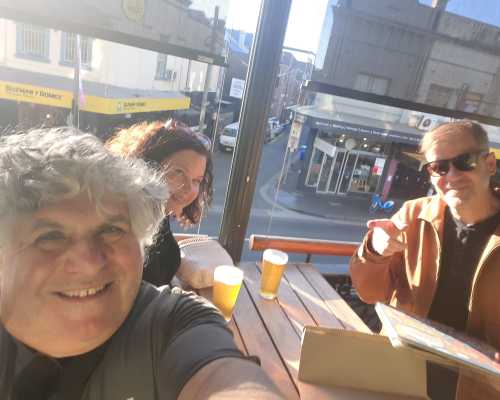 Sunny Smiles and Cold Brews on the Balcony