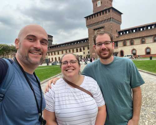 Joyful Trio Exploring Historic Castle Grounds