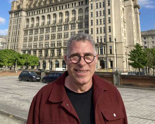 Smiles Beneath the Iconic Clock Tower