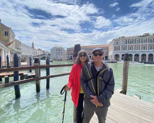 Sunlit Stroll by the Venetian Canals