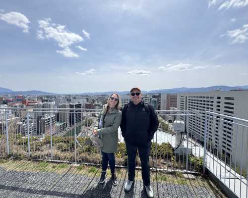 Cityscapes and Smiles: A Rooftop Moment