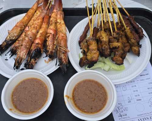 Succulent Skewers and Spicy Sides: A Culinary Delight