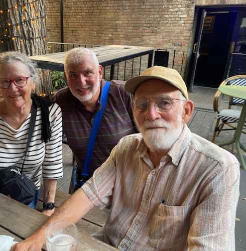 Cheers to Friendship in a Cozy Courtyard