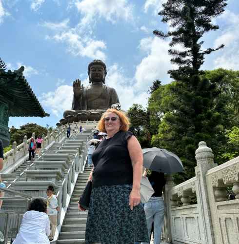 A Moment of Serenity: Standing with the Giant Buddha