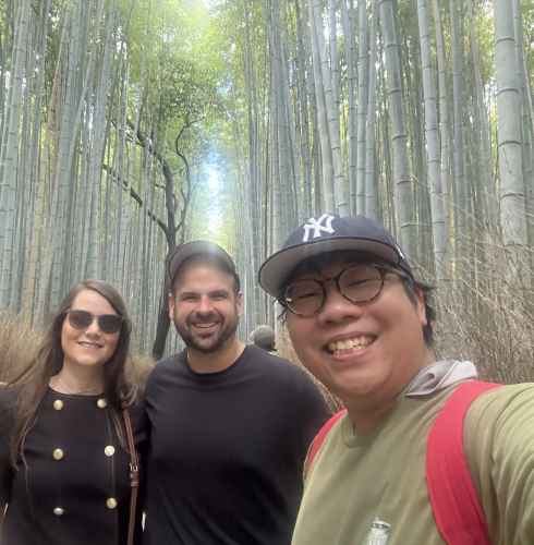 Bamboo Bliss: Friends Embracing Nature's Majesty