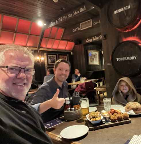 Gathered Under the Warm Glow of Friendship