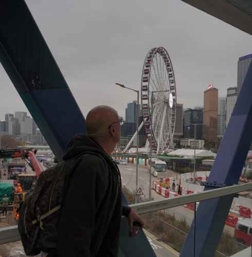 A Moment of Reflection: Cityscapes and Ferris Wheels