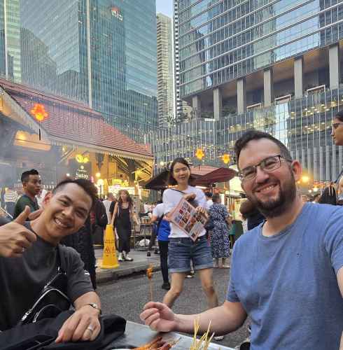 Street Food Bliss Amidst the Towers